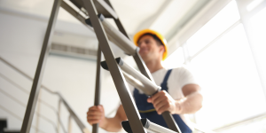 person using a ladder