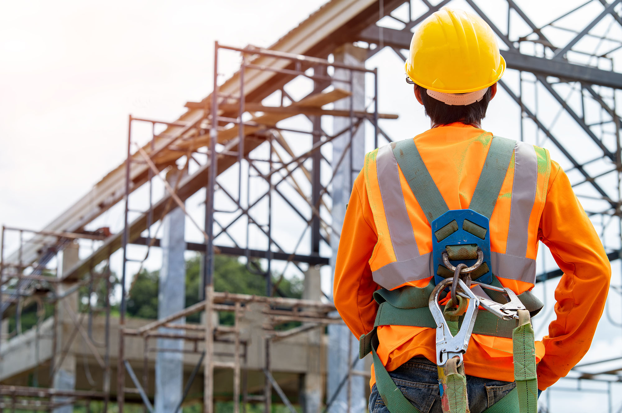 Construction-worker-wearing-safety-harness-and-safety-line