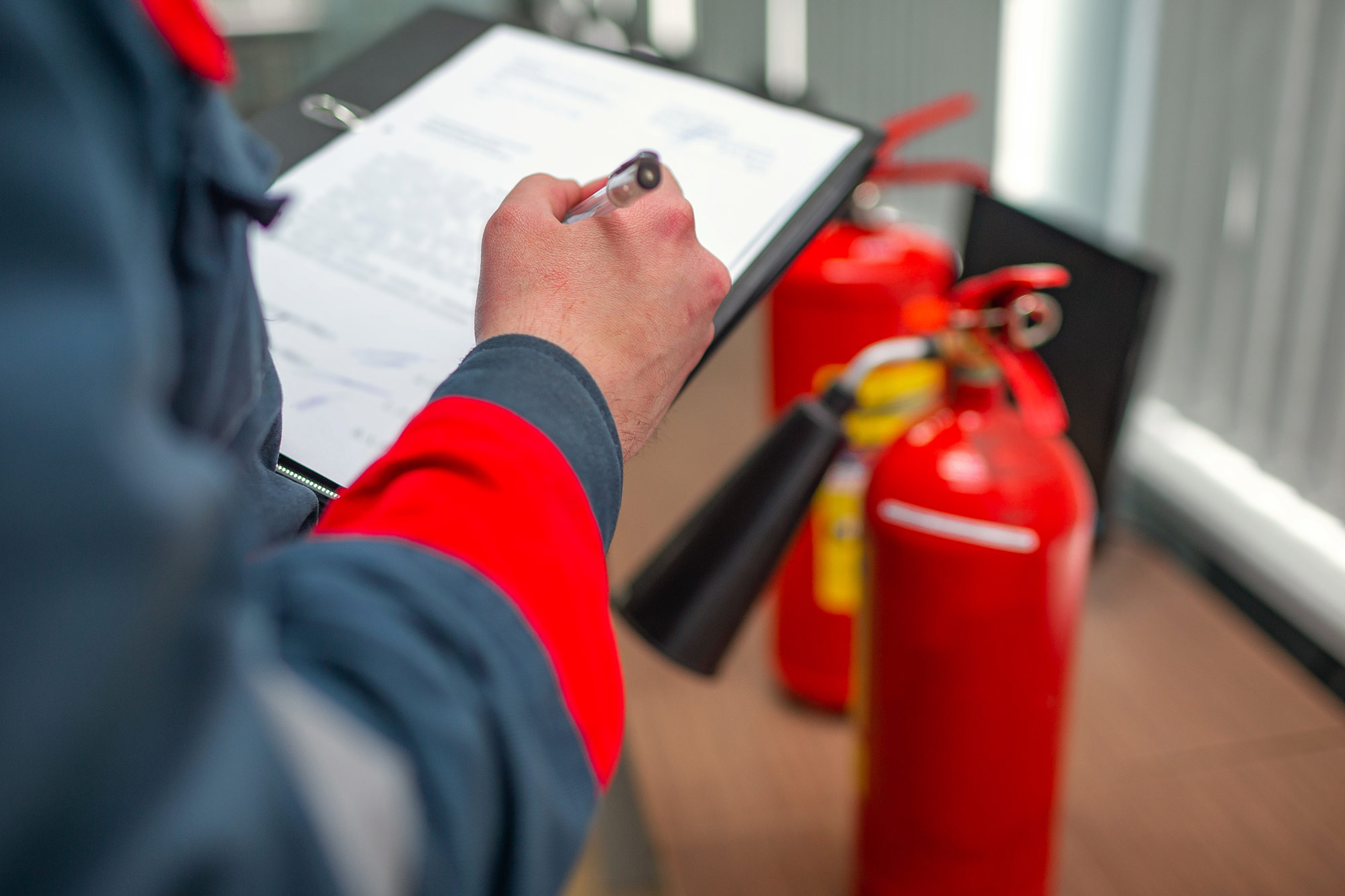 ehs-worker-conducting-fire-safety-audit