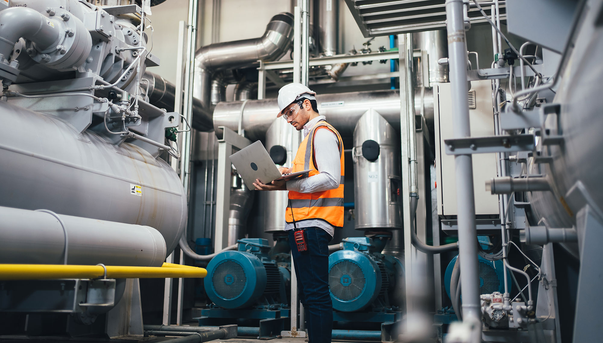 professional-worker-in-factory-using-laptop