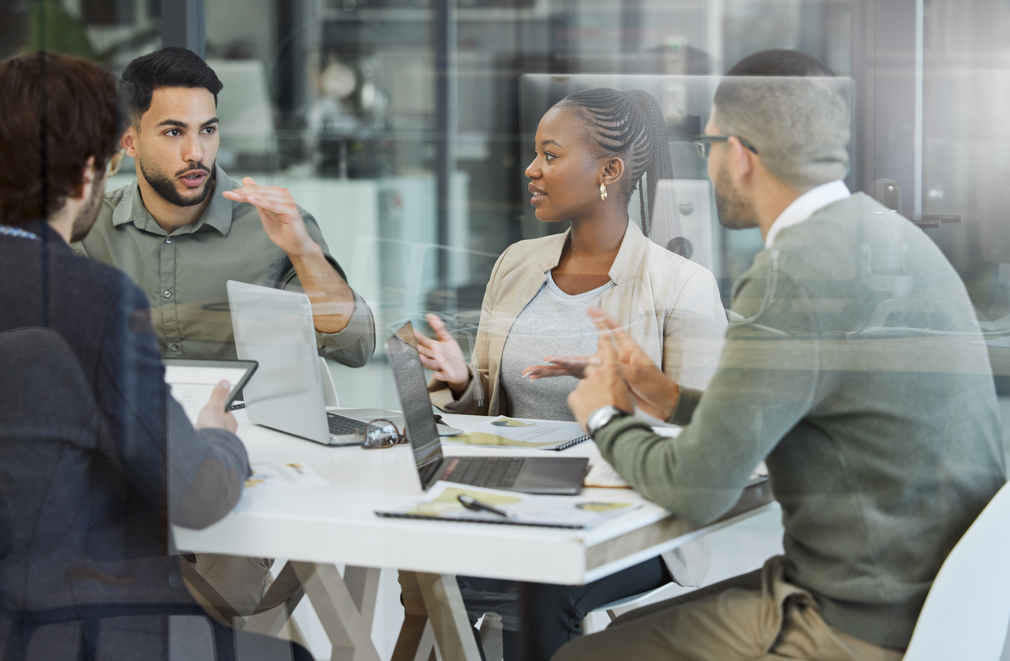 Employees collaborating in a meeting