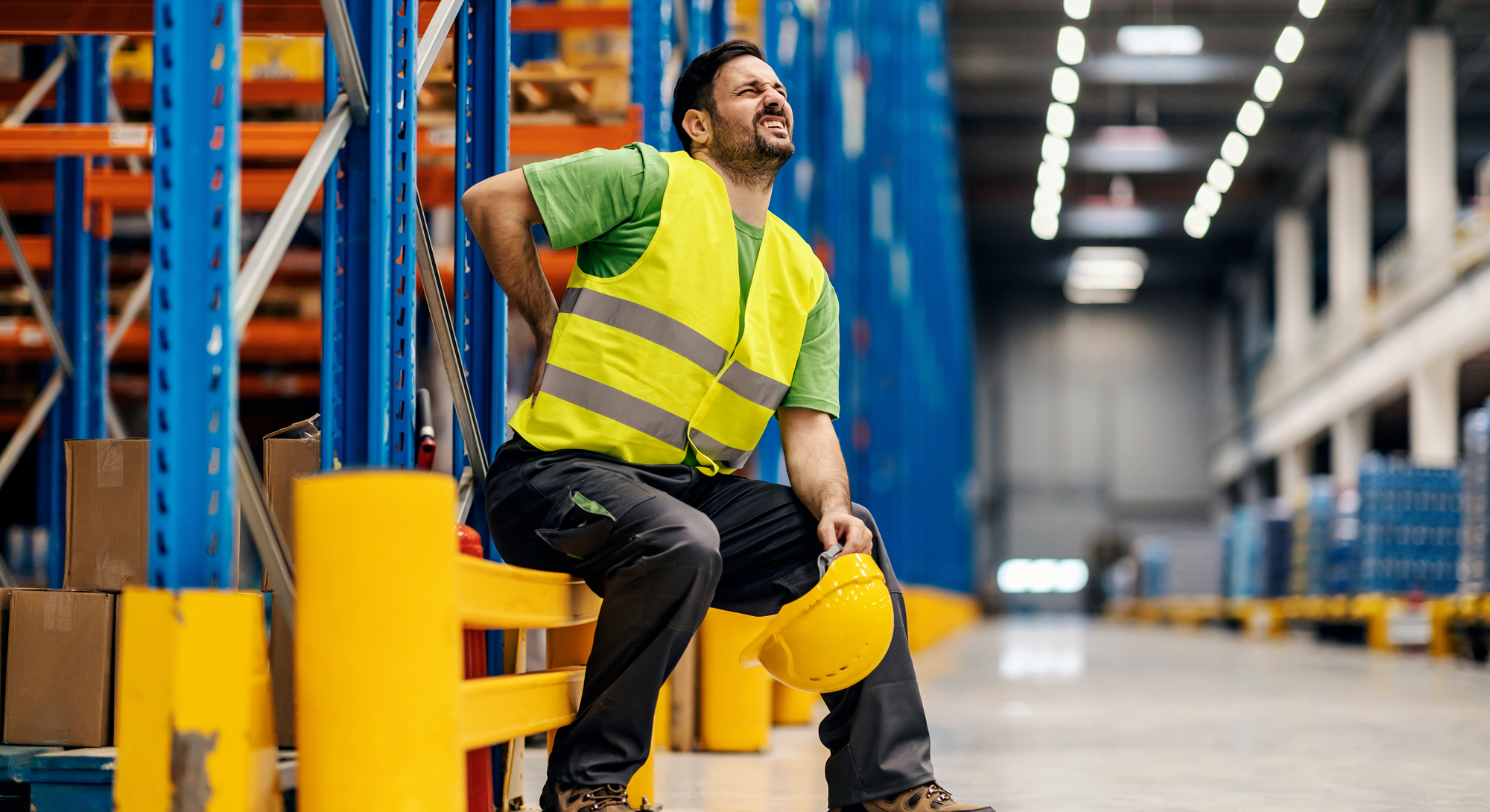 Warehouse worker with injured back