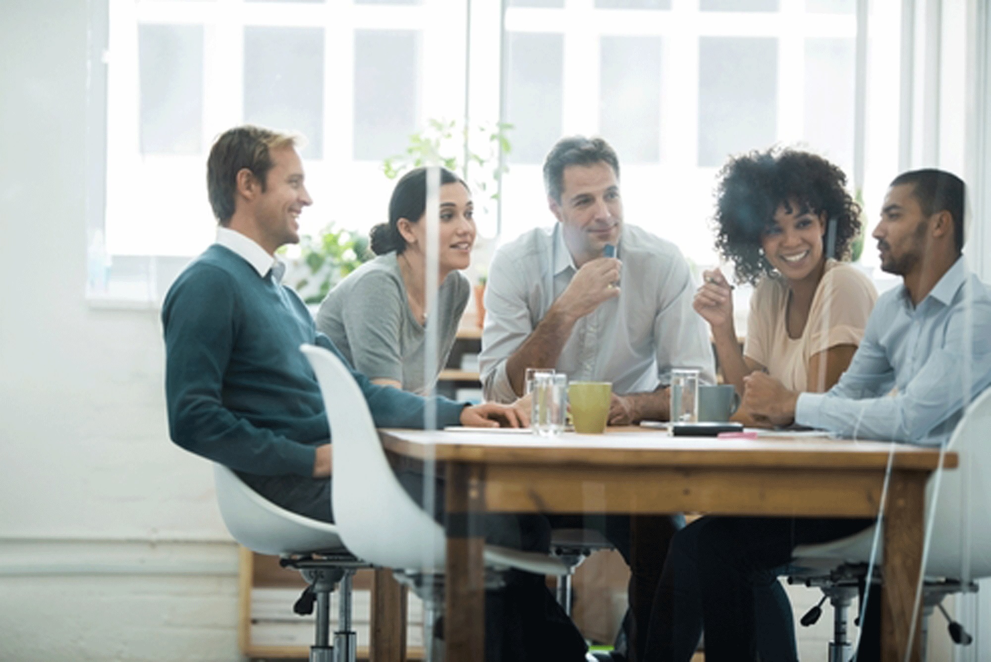 employees in an office having a discussion