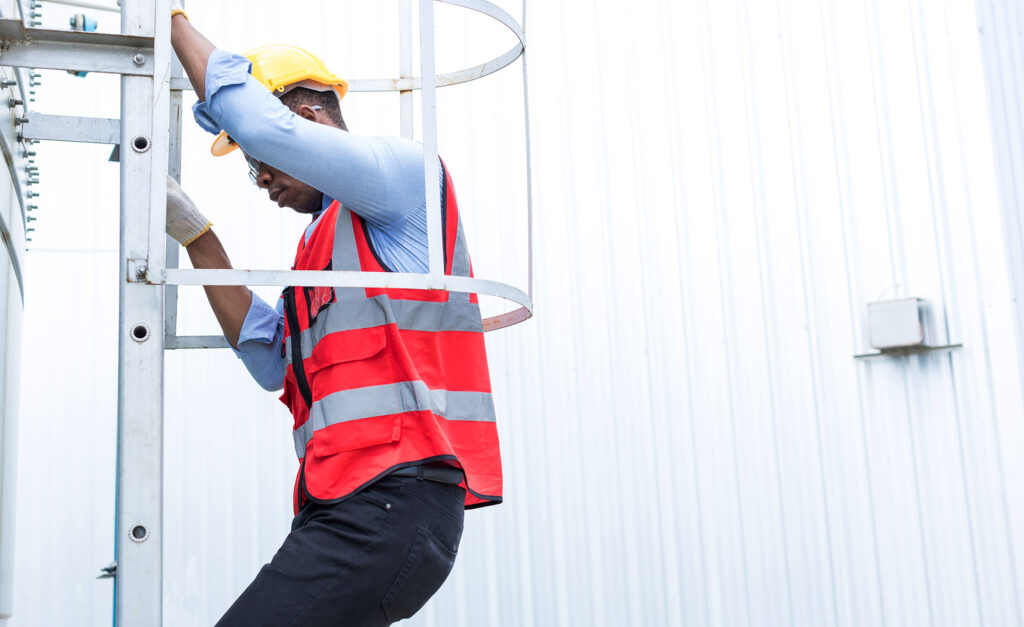 engineering worker descending fire escape