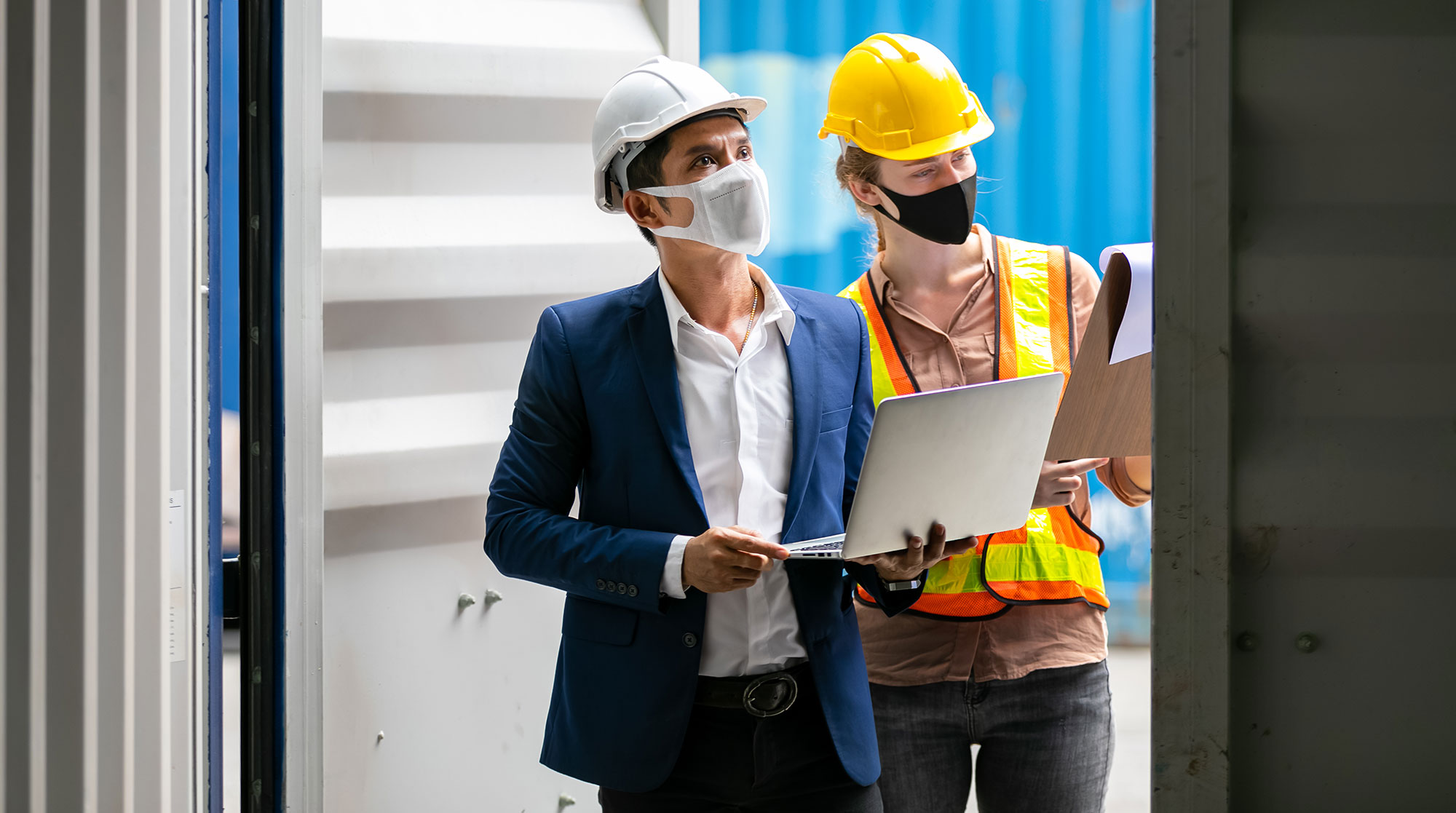 businessman-and-professional-foreman-work-at-cargo-site