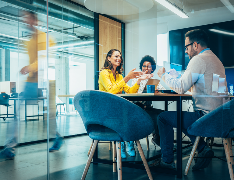 conference-room-with-folks-talking-around-a-table