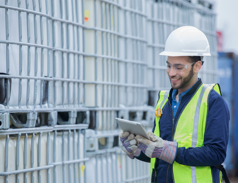 man-in-hard-hat-holding-ipad