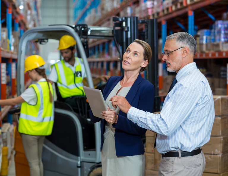 workers-examining-shelves