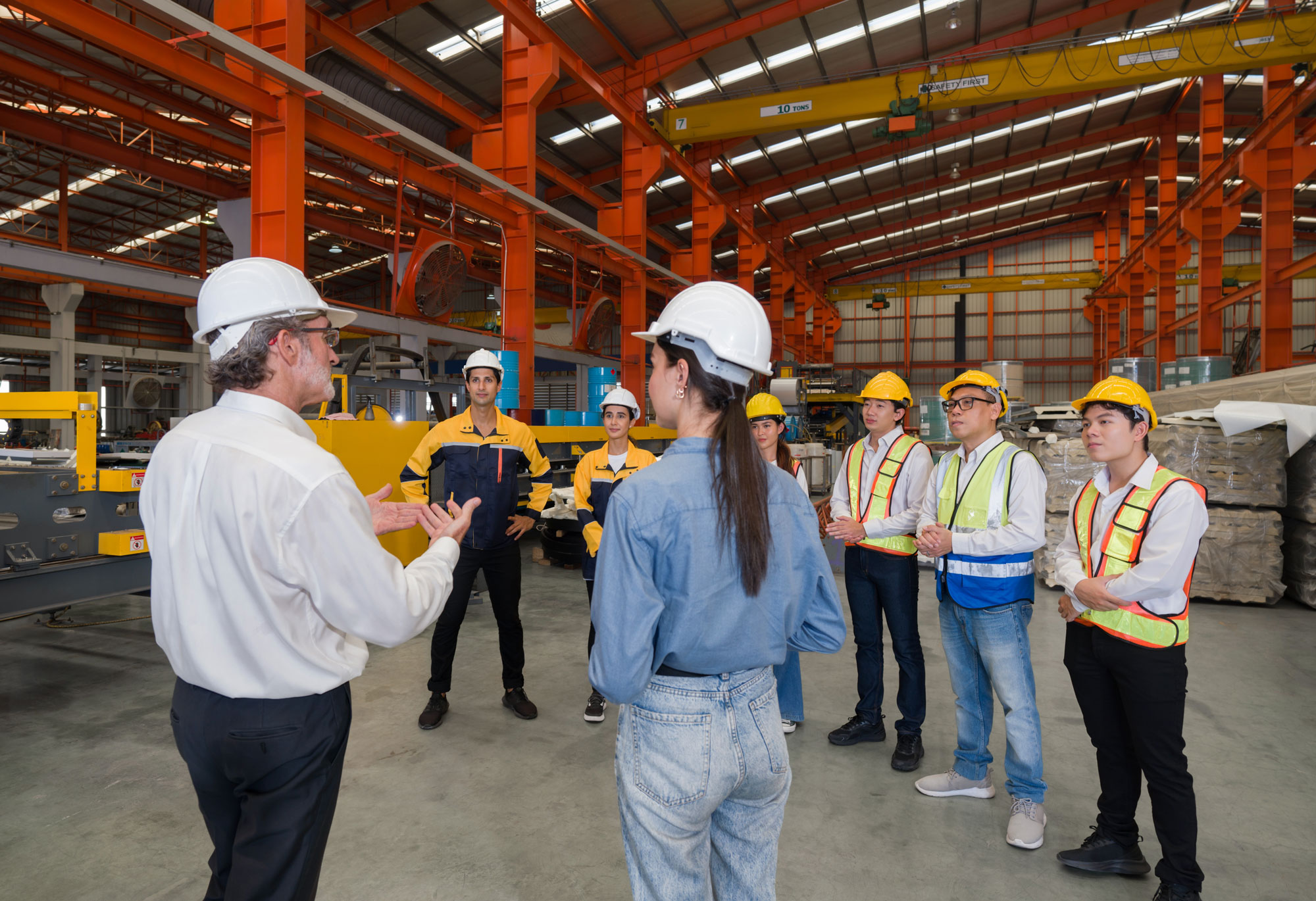 a group of workers in a safety meeting