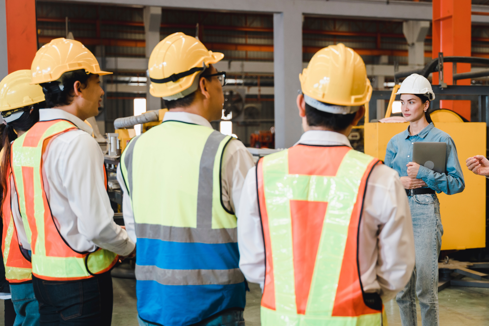 group of employees having a team safety meeting