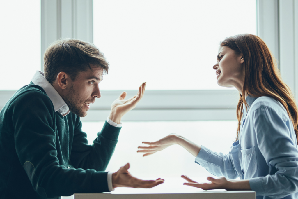 male and female coworkers having a disagreement
