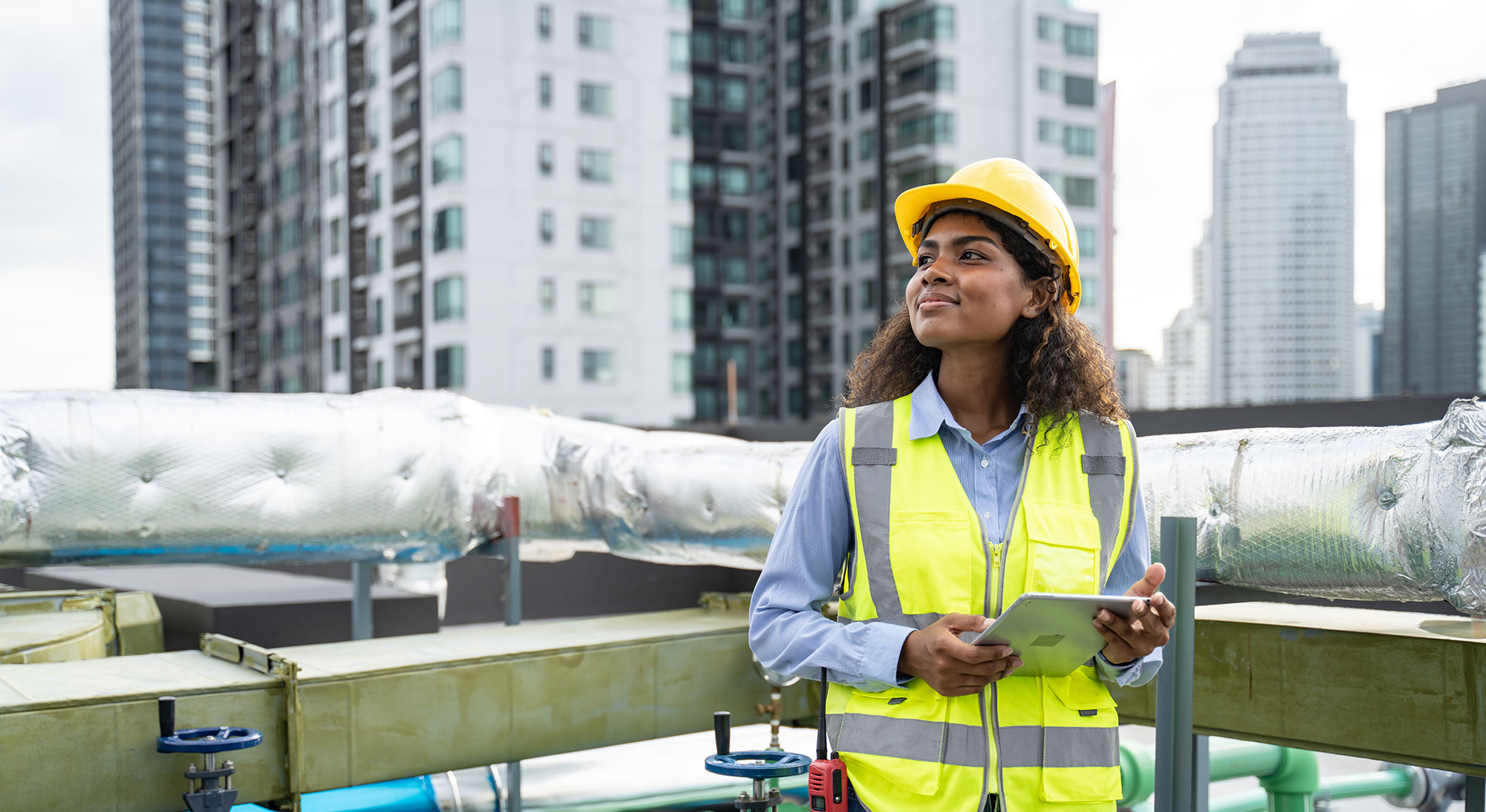 safety-engineer-in-hard-hat-performing-inspection-with-tablet