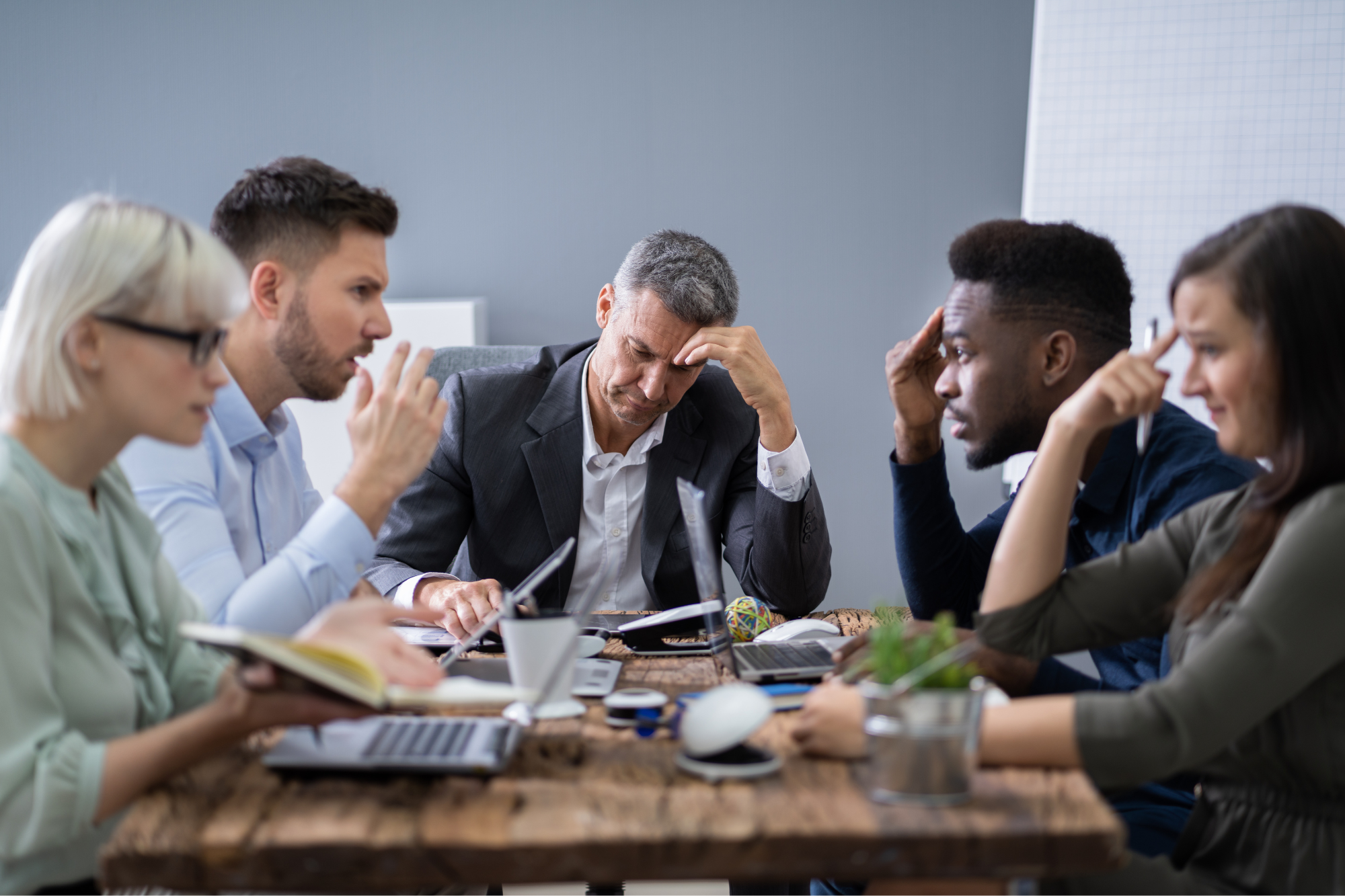 diverse group of workers having a disagreement