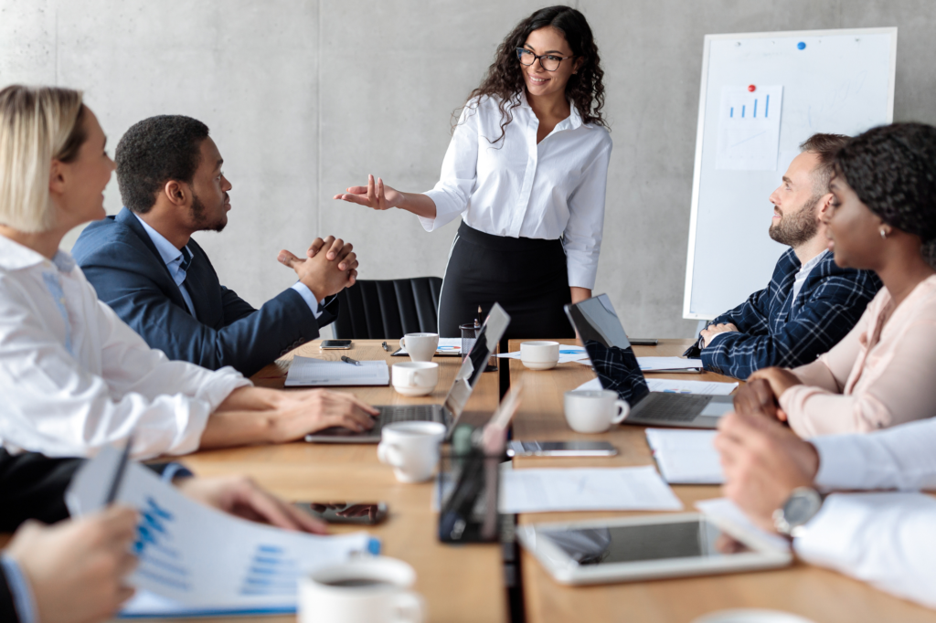 group of employees working collaboratively in a compliant workplace