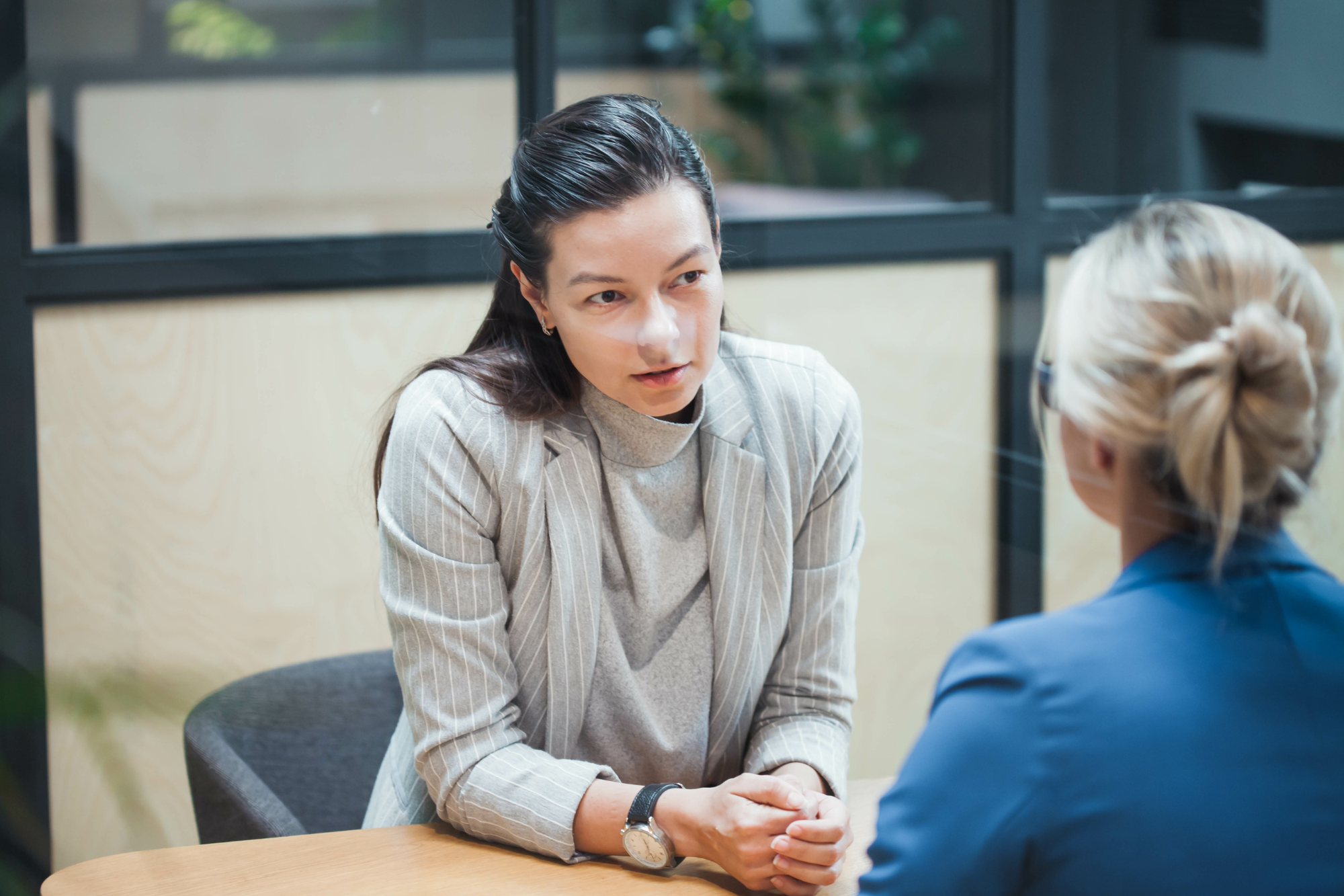 HR professional providing concrete feedback to an employee