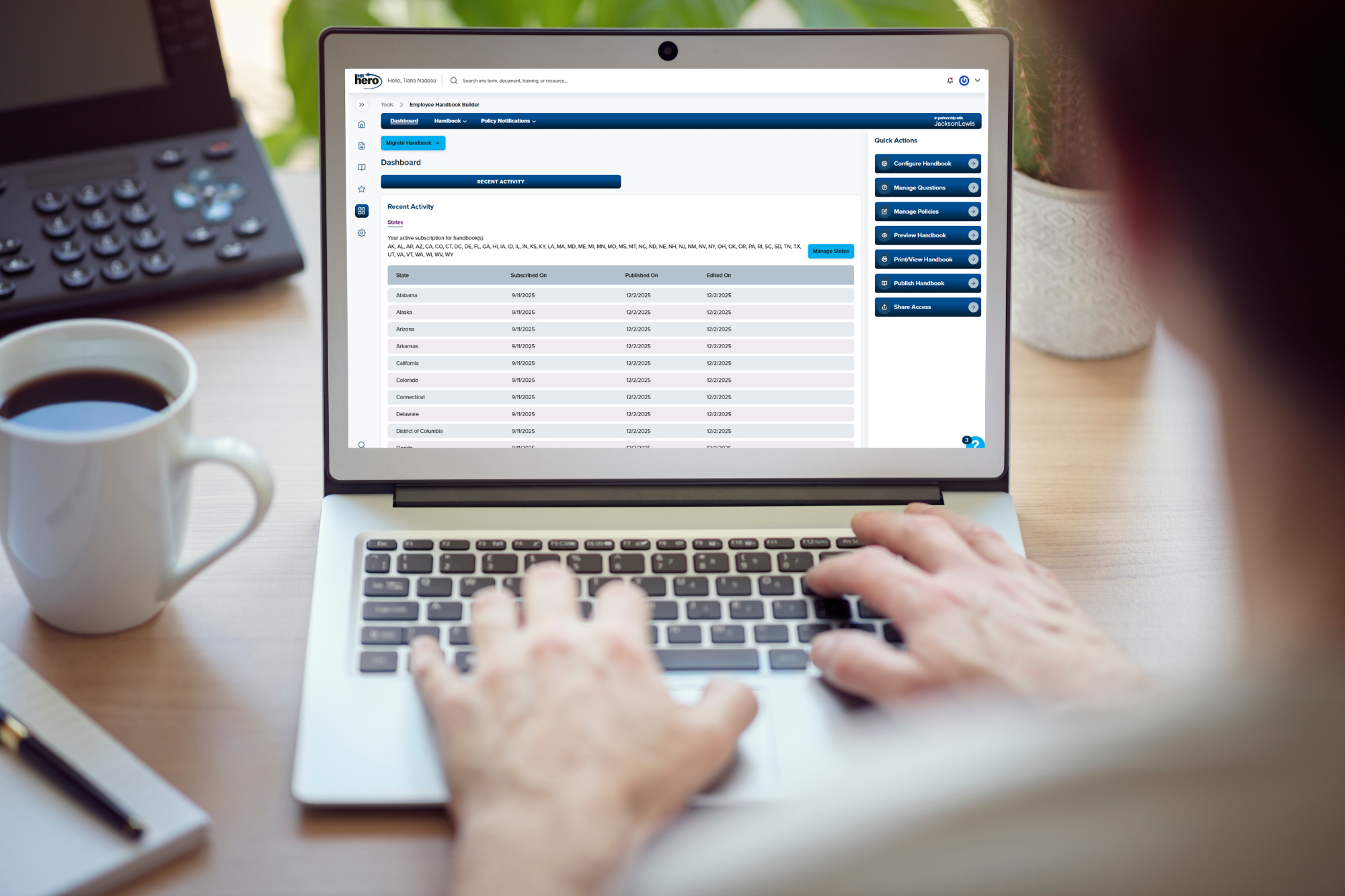 Desk Laptop with BLR's company handbook builder dashboard (1)
