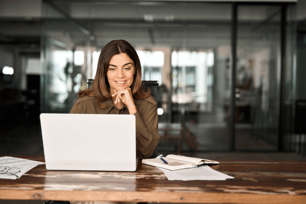 business woman in office using laptop
