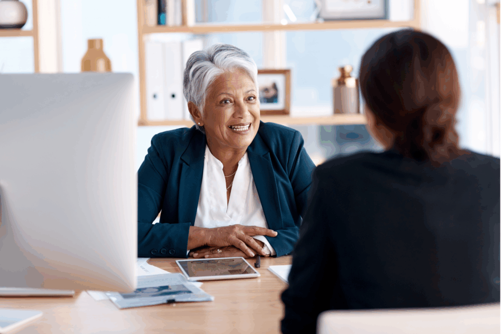 Meeting, talking or senior manager in job interview with business women in b2b negotiation discussion.