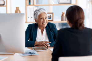 Meeting, talking or senior manager in job interview with business women in b2b negotiation discussion.