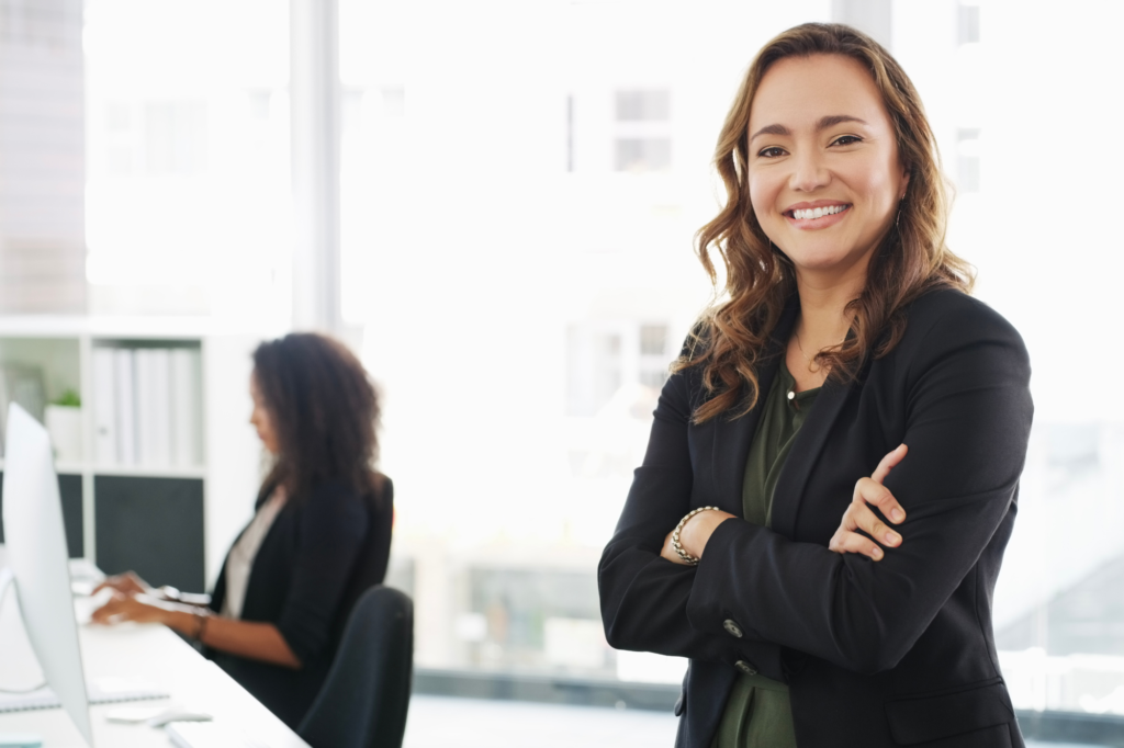 Portrait, smile or woman with arms crossed in office, labor law compliance or human resource management.