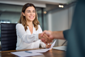 HR consultant shaking hands at a business meeting